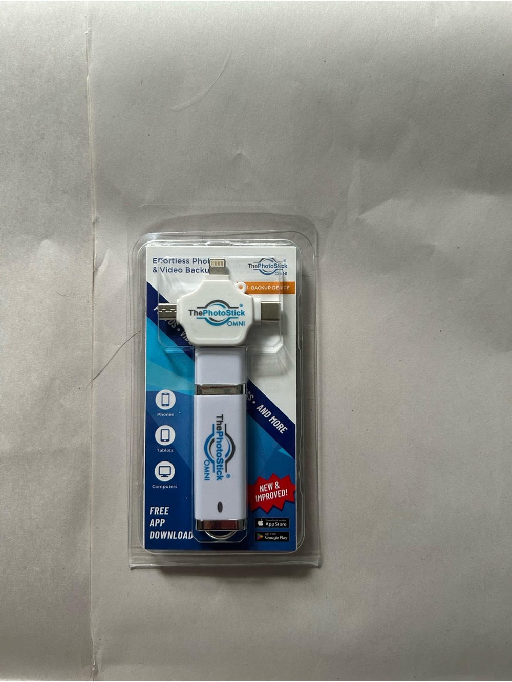 ThePhotoStick OMNI Photo & Video Backup - 64 GB w/universal connection dongle.
